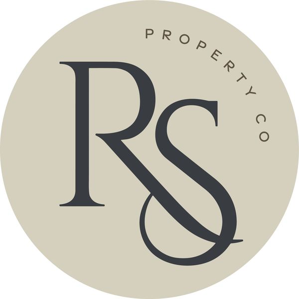Elegant logo with intertwined RS letters for a property company.