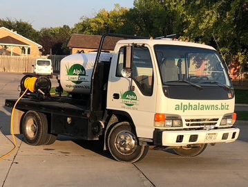 Spray truck used to fertilize and spray for weeds by Alpha Lawn Care LLC in Kearney 