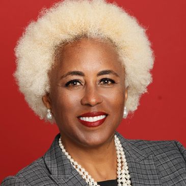 Woman enjoying a luxury beauty photography session, relaxed and confident in front of the camera