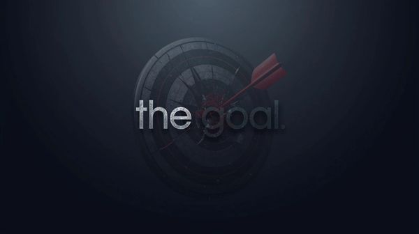 A dart hits the bullseye with the words 'the goal' overlayed.