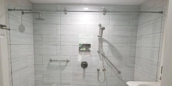 Frameless Sliding shower enclosure, barn door style