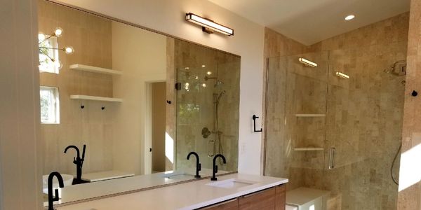 Mirror and Frameless shower enclosure 