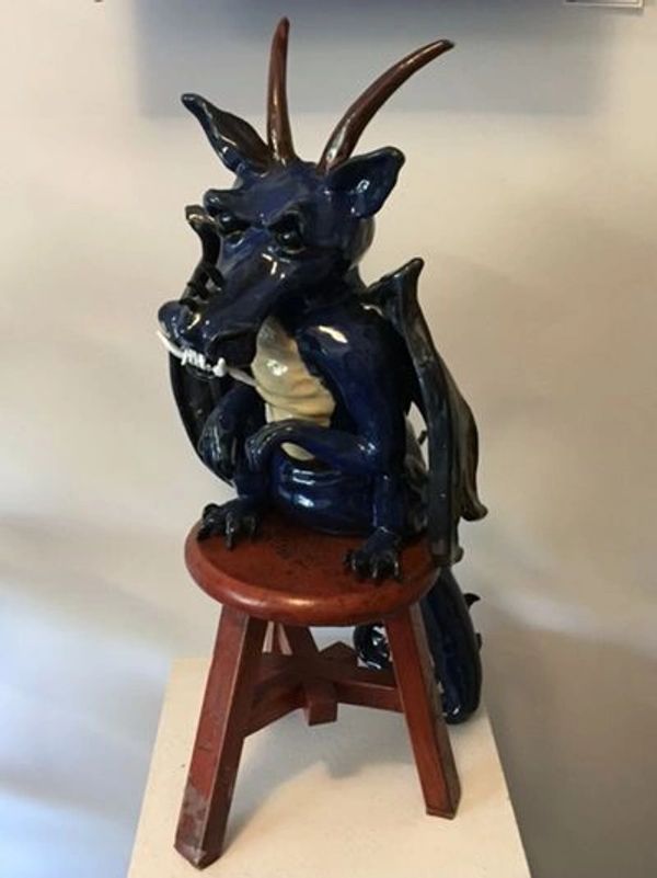Blue Dragon on an orange stool