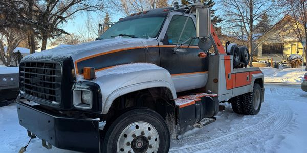 A Truck On A Pile Of Snow Image