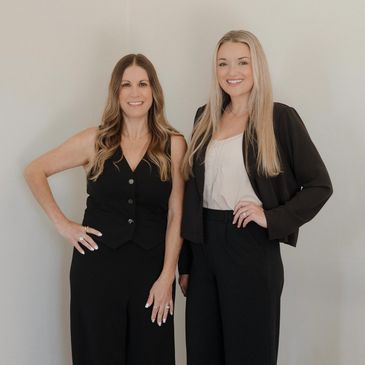Allie Webber and Jessica Fitzpatrick, the real estate professionals behind Central Coast Life Realty, smiling together on the Central Coast.