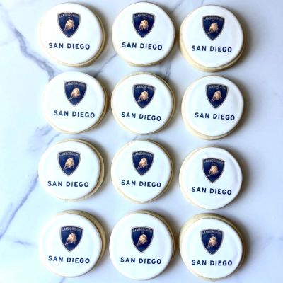 Twelve cookies with Lamborghini San Diego logo.