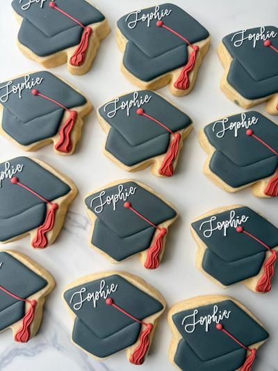 Graduation cap cookies with the name Sophie.