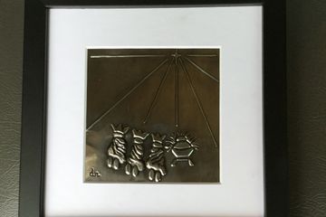 This adorable  design was embossed on a 5X5 piece of metal and matted and framed in a 8x8 black fram