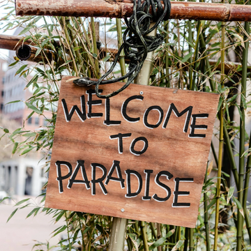 Event sign that says Welcome to Paradise