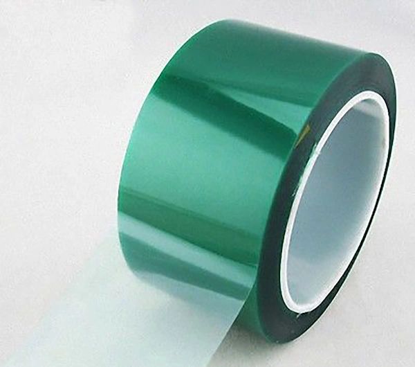 A roll of green adhesive tape with a transparent sticky end.