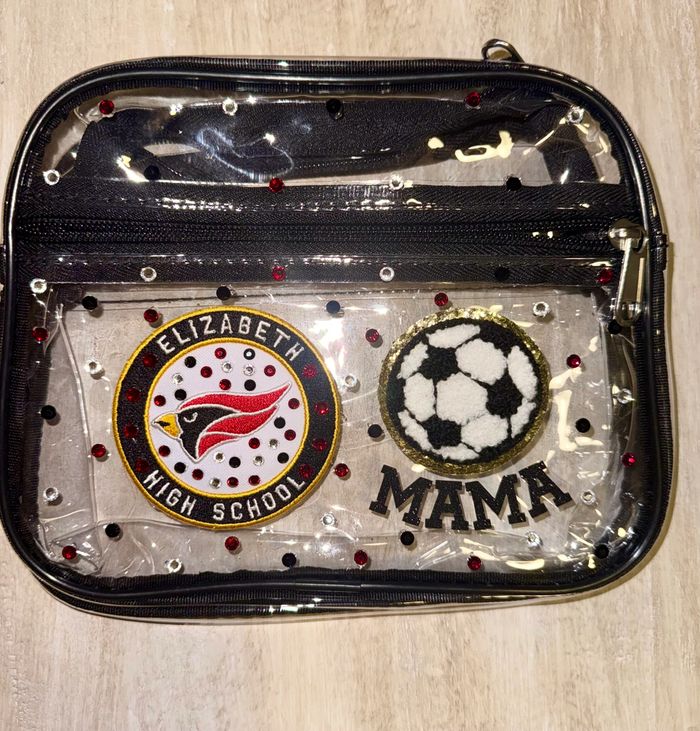 3 pocket crossbody. Elizabeth High School and soccer Mama patches.