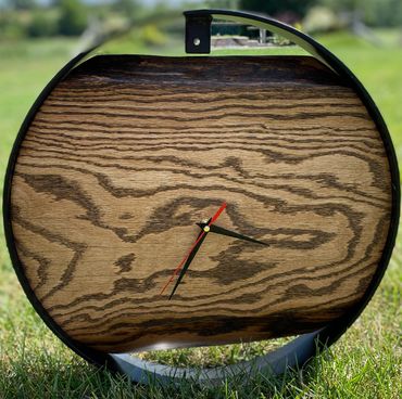 Oak Clock
16” metal ring with fitting to hang 
Simple design
