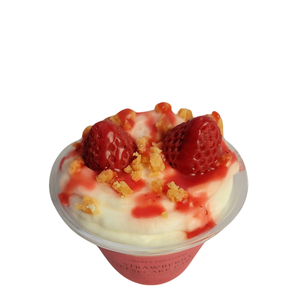 Strawberry parfait scoopable candle with wax strawberries and wax crumbles.