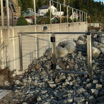 Waterfront metal cable gate.