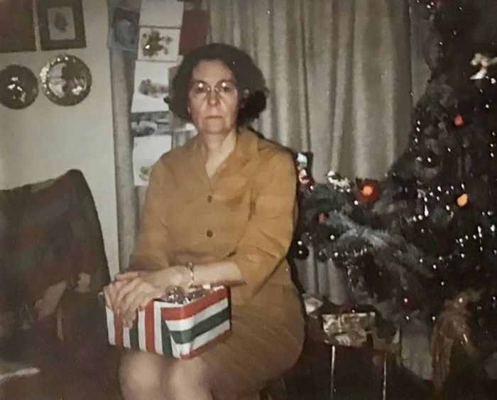 Wilma Elizabeth McDaniel, the Dust Bowl poet, sitting  by a Christmas tree.