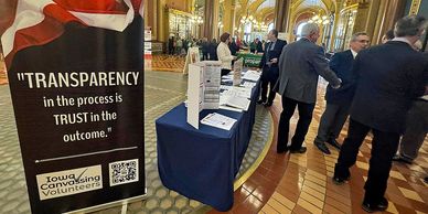 Legislators visit hand counting demonstration.