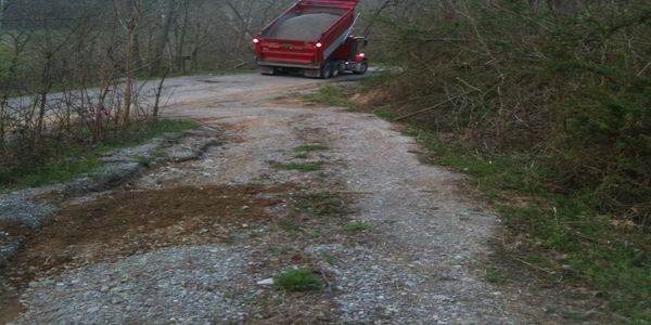 We install and repair driveways and we have a roller compactor to compact the gravel into place so y