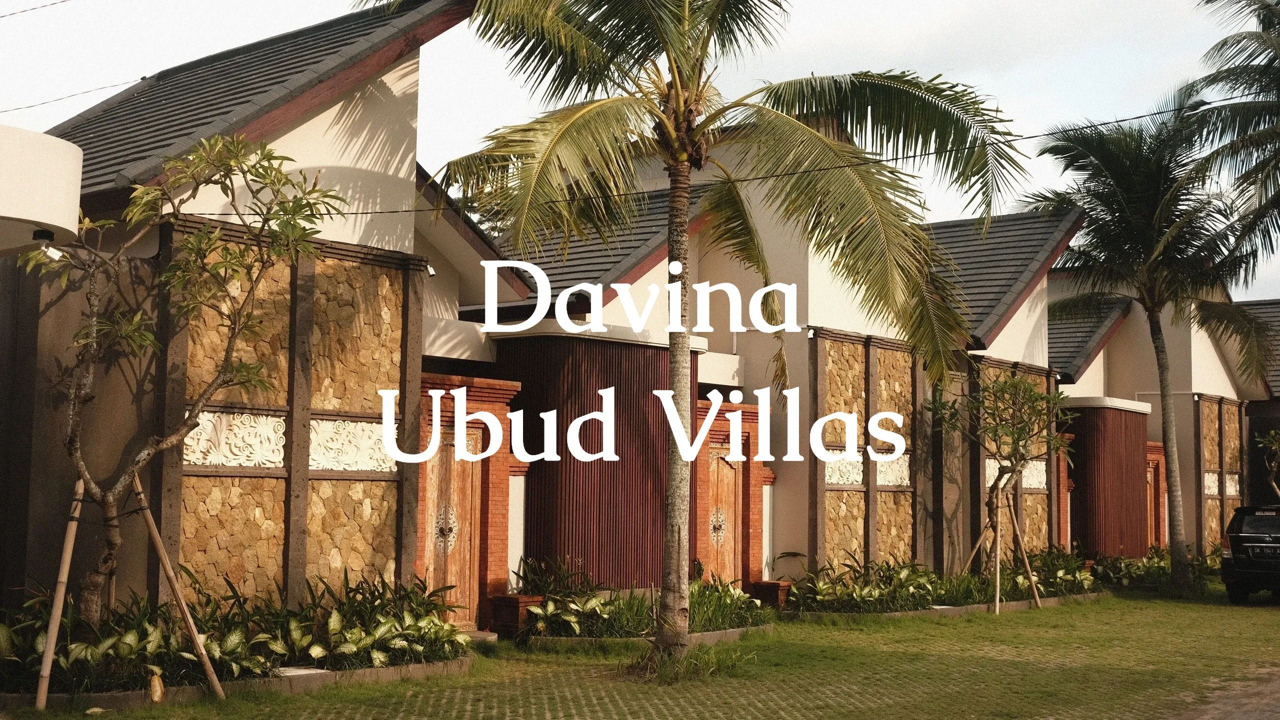 Exterior view of Davina Ubud Villas with tropical landscaping and traditional architecture.