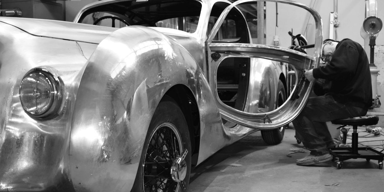 English wheel coachbuilding service UK.