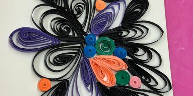 close up of a quilling project