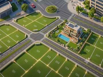 Aerial view of a residential plot layout with a modern house.