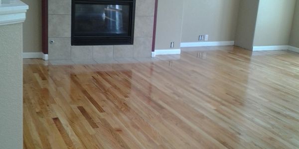 Installation sand and finished of new oak flooring 