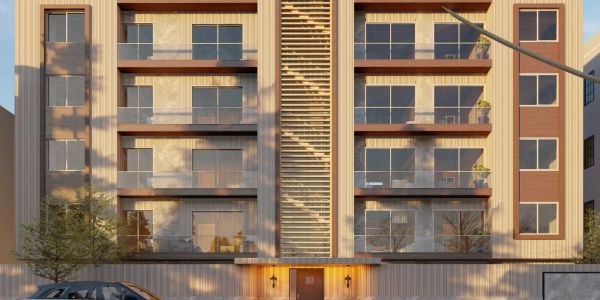 Modern apartment building facade with balconies and large windows.