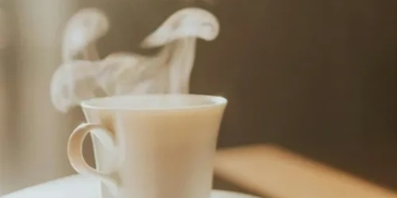 Steaming hot cup of coffee.