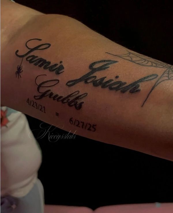 Tattoo with names Samir Josiah Grubbs and dates, featuring a spider and a spider web.
