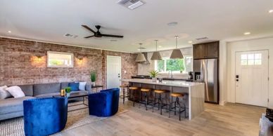 A tidy living room and kitchen