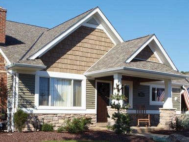Cozy suburban house with a front porch.