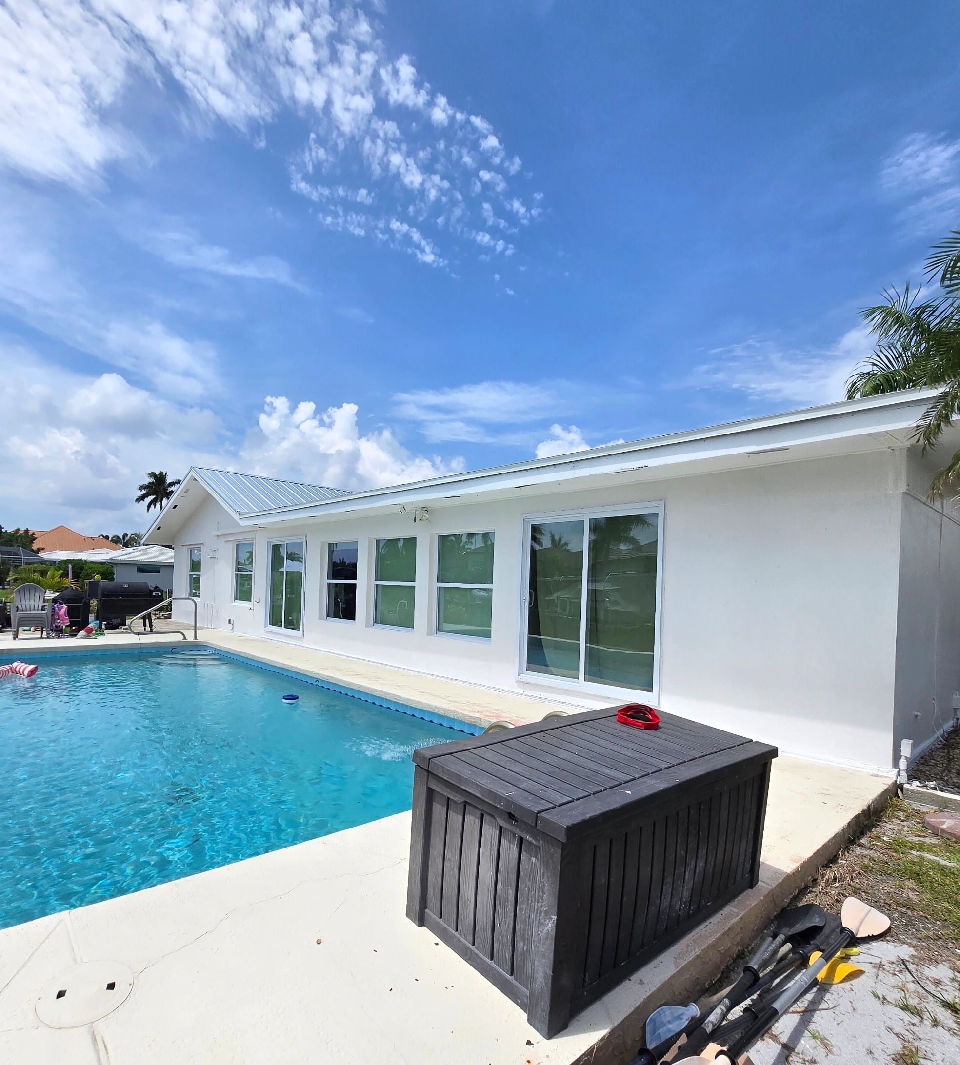 Freshly painted white home with pool in Punta Gorda, FL