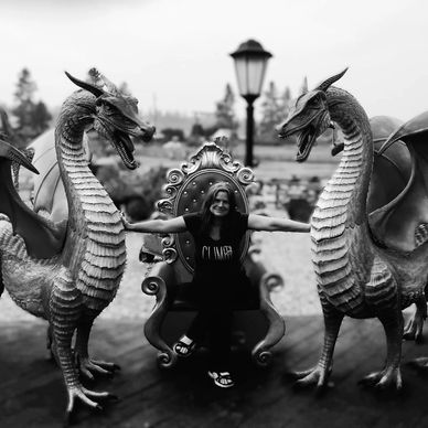 I am seated on a throne between two dragons