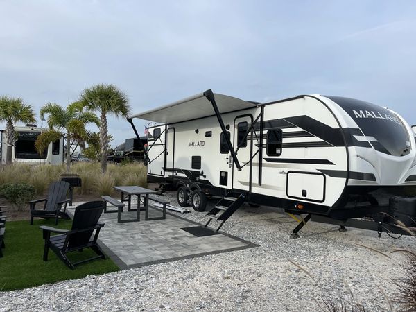 RV rentals and seating arrangement outside 