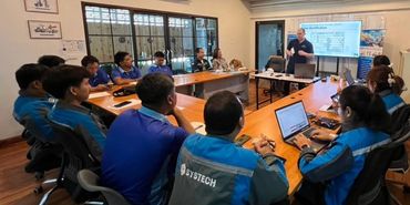 Team attending a training session in a conference room.