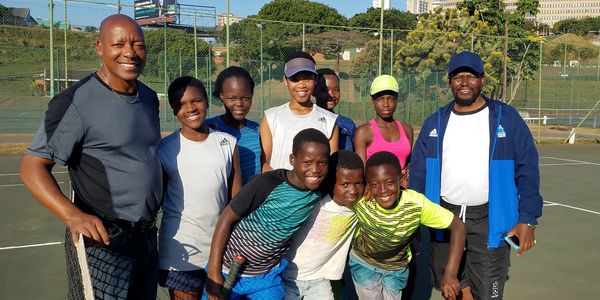 Richman (left) at the Coach Emmanuel Ngema (right) tennis clinic at Westridge Park, Durban
