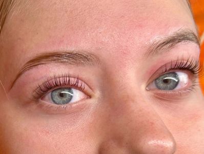 Close-up of blue eyes with long eyelashes.
