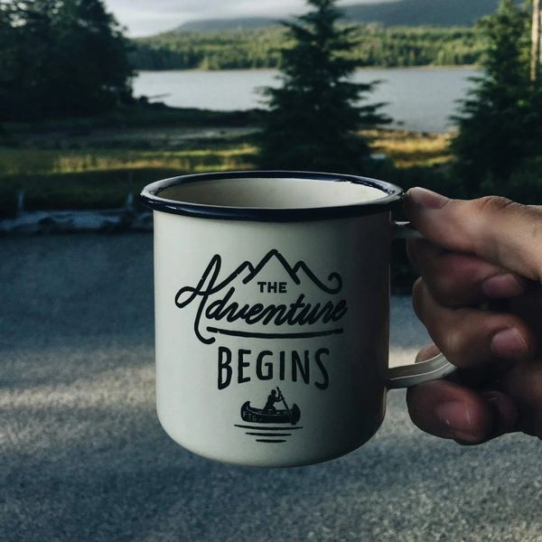 Coffee cup indicating the Adventure begins