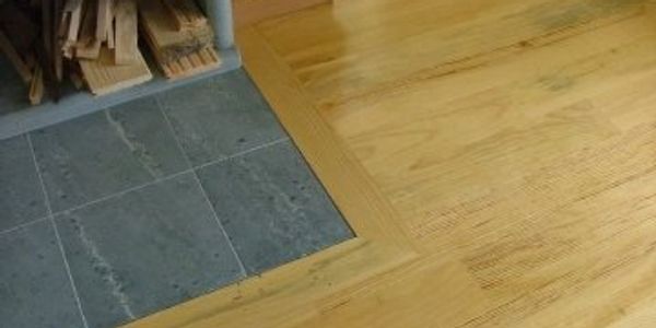Custom Milled 6" Ponderosa Pine softwood floors finished with quick dry sealer and Synteko Best wate