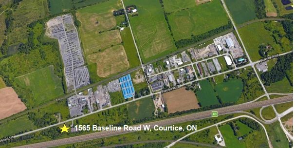 Aerial view of 1565 Baseline Road W, Courtice, ON area with roads and farmland.