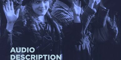 Blue-tinted black and white still from 1916 film 'The Pride of the Clan'. A smiling Mary Pickford ho