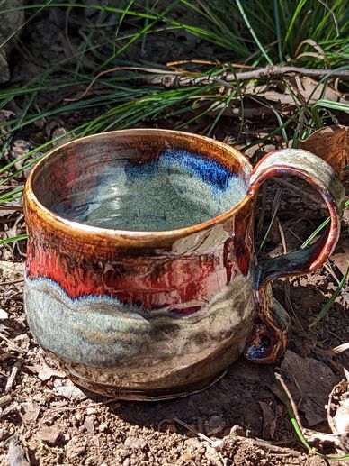 mug with handle red, black, iron glazes 