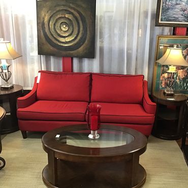 Red sofa
Modern coffee table and 2 end tables