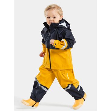 preschool Child in full outdoor school rain suit gear