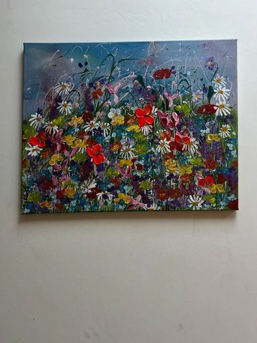 summer meadow, bursting with sweet peas, poppies, daisies, buttercups