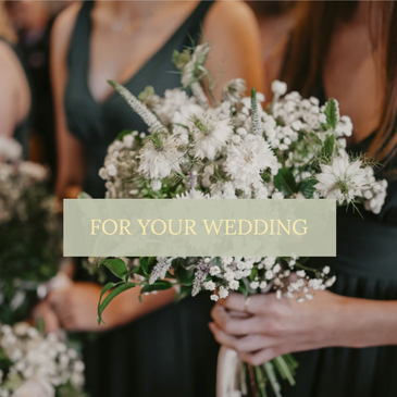 Naturally styled green and white bridesmaid bouquet with nigella and gypsophila.