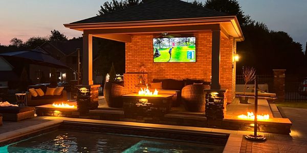 Briggs Electric Outdoor Living Space with fire bowls and gazebo.