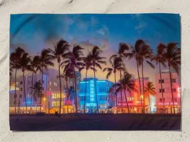 beach towel Ocean Drive neon colorful Art Deco Miami hotels palm trees twilight Miami Beach towels