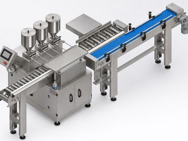Industrial automated filling and packaging machine.