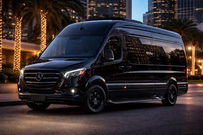 Black luxury Sprinter van representing comfortable, refined group transportation.
